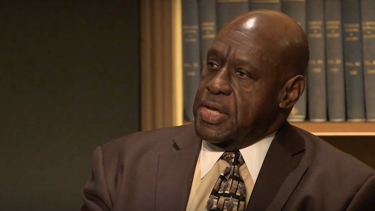 The Rev. Ronald English speaking in Riggs Library