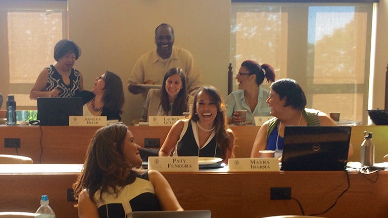 Patricia Funegra, founder and CEO of La Concina VA, laughs in class. 