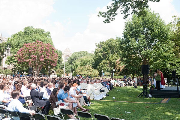 A photo of the students seated on Healy Lawn during the annual Mass of the Holy Spirit.