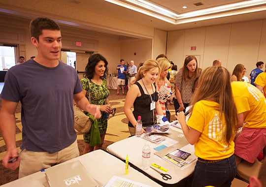 Freshmen and transfer students receive their New Student Orientation materials during NSO Check-In at the Leavey Center.