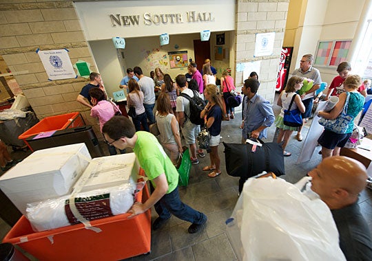 The lobby of New South Hall bustles with parents and new students Aug. 24 as move-in for the 2012-13 academic year begins.