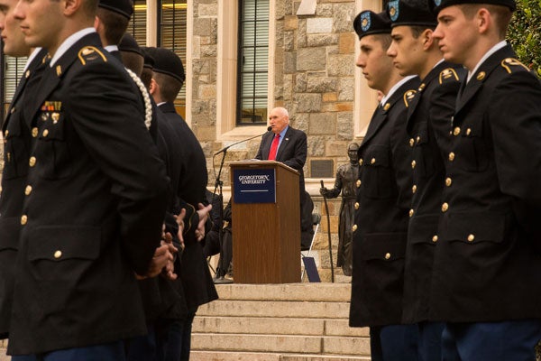 Retired U.S. Army Maj. Gen. Robert Scales addresses the Georgetown community from a podium.