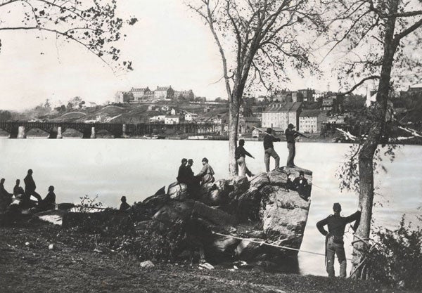 Union soldiers look toward the Georgetown campus in this archived photo from 1863.