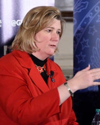 Nan Whaley sits while speaking in Copley Formal Lounge