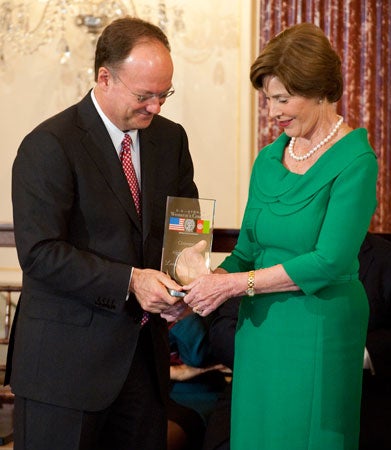 John J. DeGioia and Laura Bush 