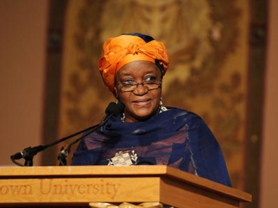 Zainab Bangura stands at the lectern in Gaston Hall while speaking