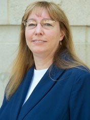 Dr. Chelsea Kidwell smiles in a headshot. 