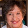 Dr. Judith R.F. Kupersmith smiles in a headshot. 