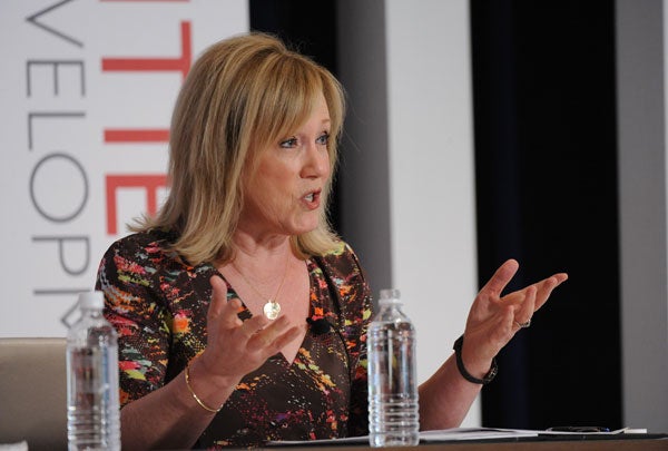 Kay Warren speaks while seated and gestures with her hands