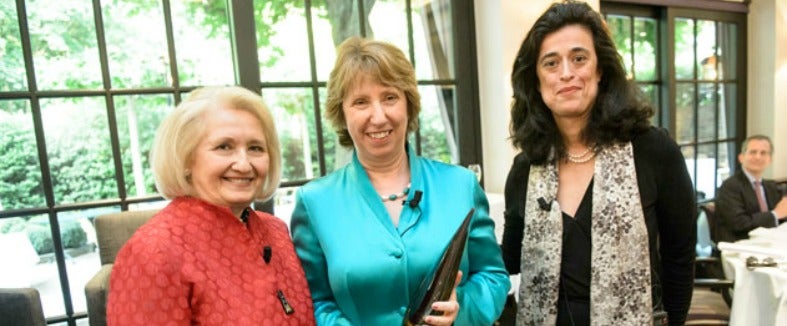 Lady Catherine Ashton receives an award with Melanne Verveer and Shéhérazade Semsar-de Boisséson 