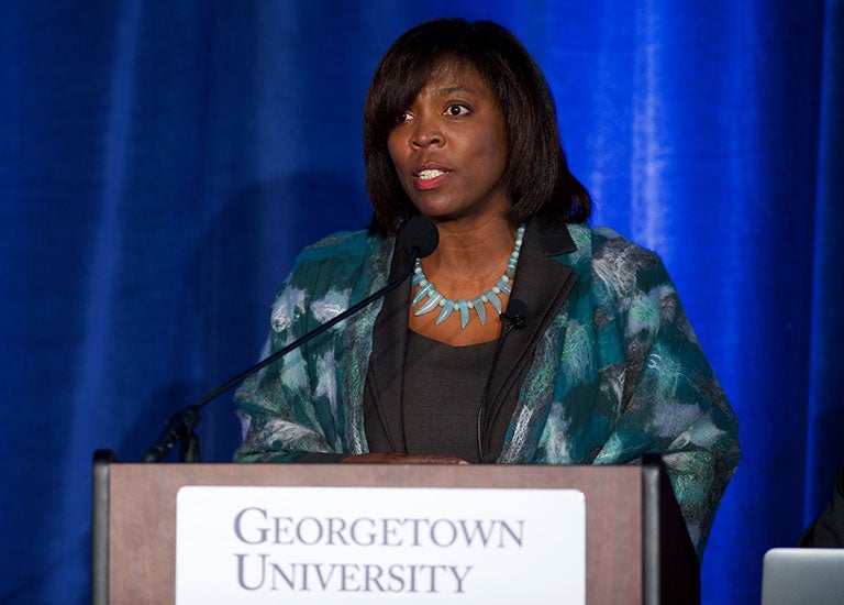 Executive Director of the United Nations World Food Programme Ertharin Cousin speaks on stage.