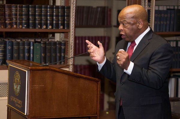 John Lewis speaks at a podium in Riggs Library