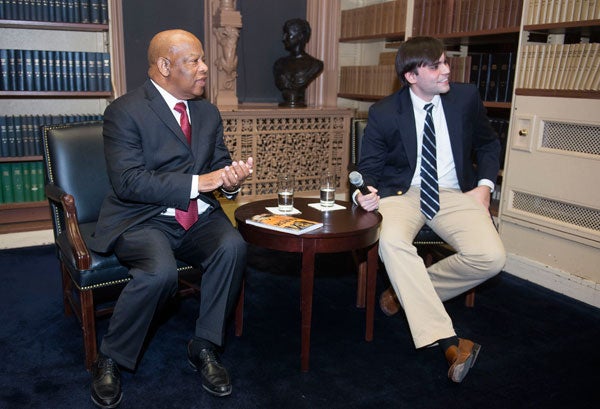 John Lewis and Andrew Aydin sit during a discussion in Riggs Library