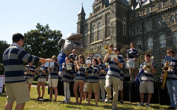 The Georgetown University Pep Band plays instruments on the lawn during the fall picnic. 