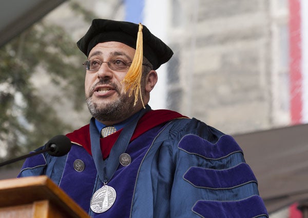 Imam Yahya Hendi, the Muslim chaplain at Georgetown, offers the invocation onstage.