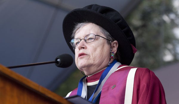 Carol Lancaster, dean of the School of Foreign Service, addresses the graduates from the podium.