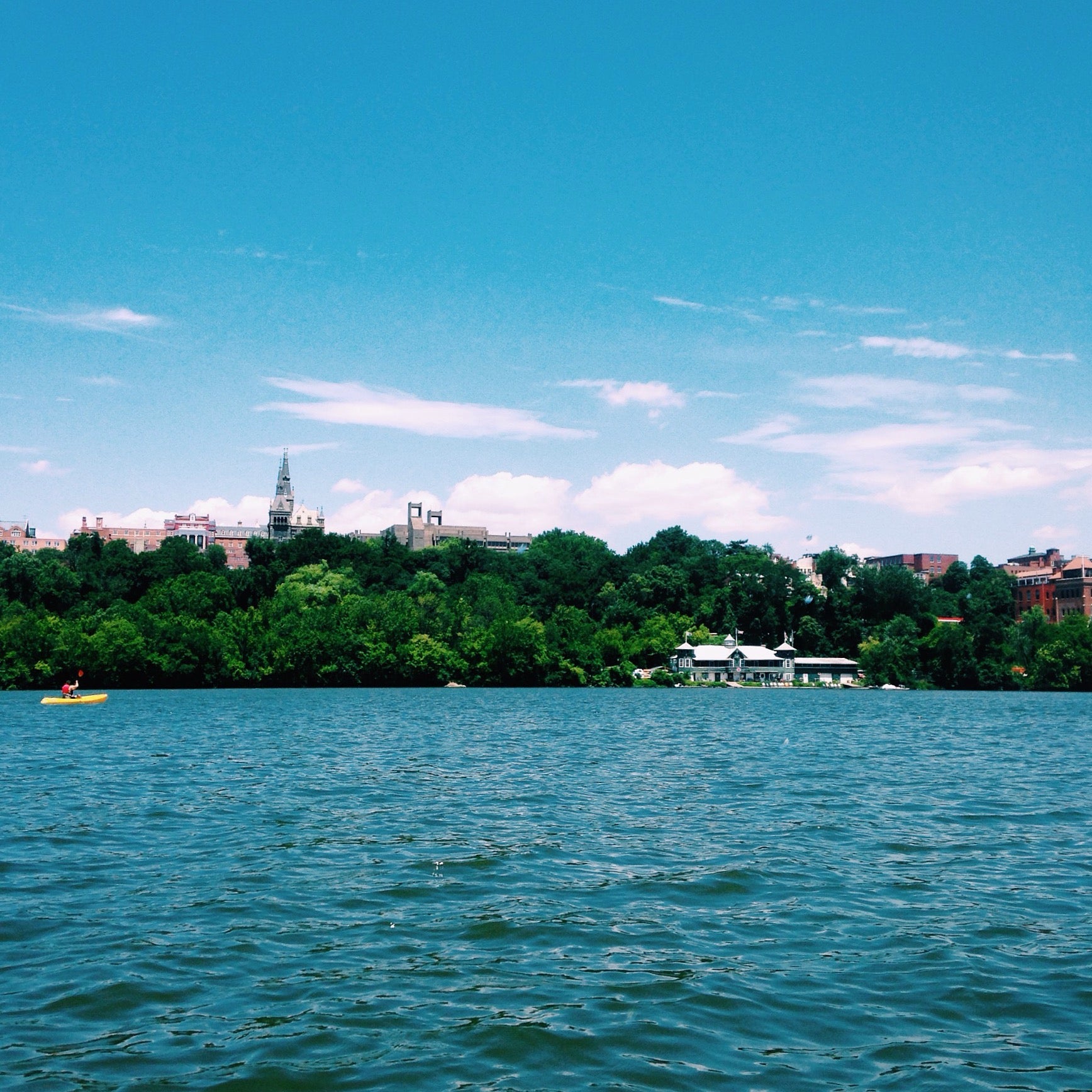 Campus rises above the Potomac on a sunny day