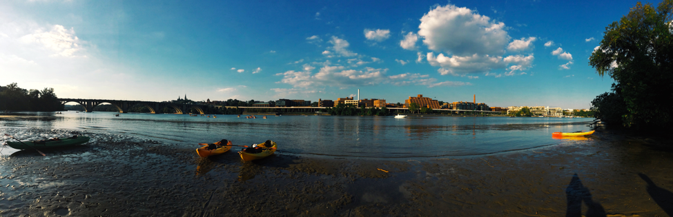 Panoramic shot of the Potomac River including two people kayaking